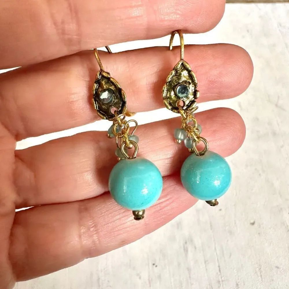 Gold tone blue beaded drop earrings